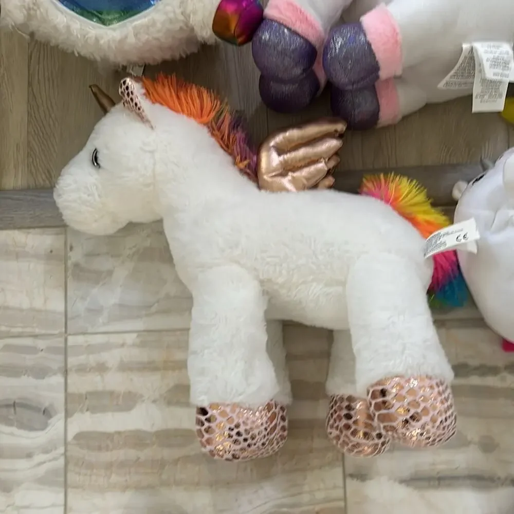 Unicorn plush bundle of mixed sizes brands colors all in euc or nwt set of 7